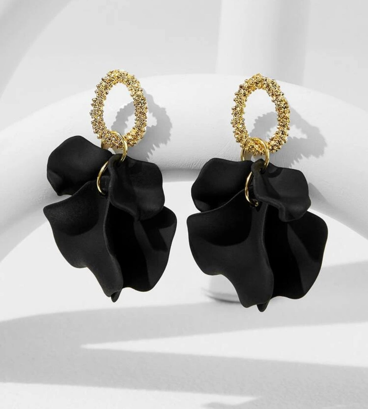Black petal drop earrings
