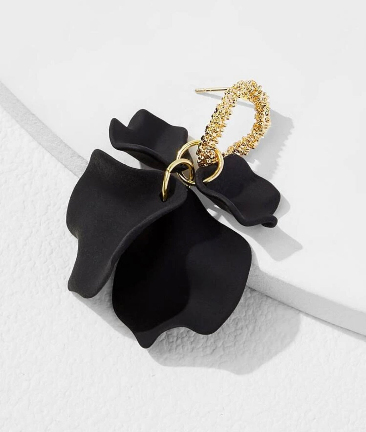 Black petal drop earrings
