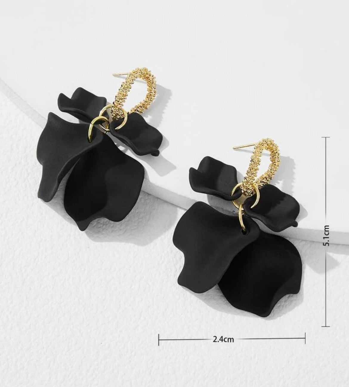 Black petal drop earrings