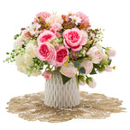 White and pink artificial flowers – “made for mum”
